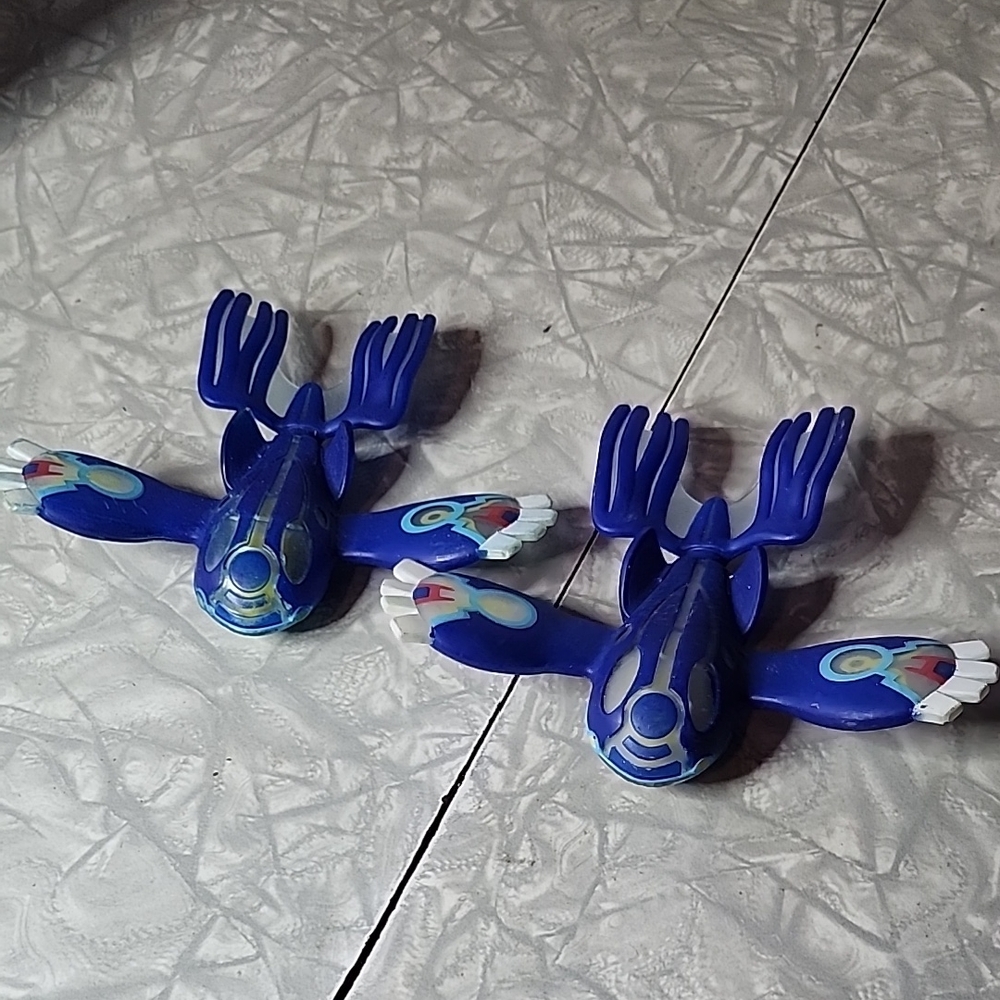 Blue and White Toy Figures